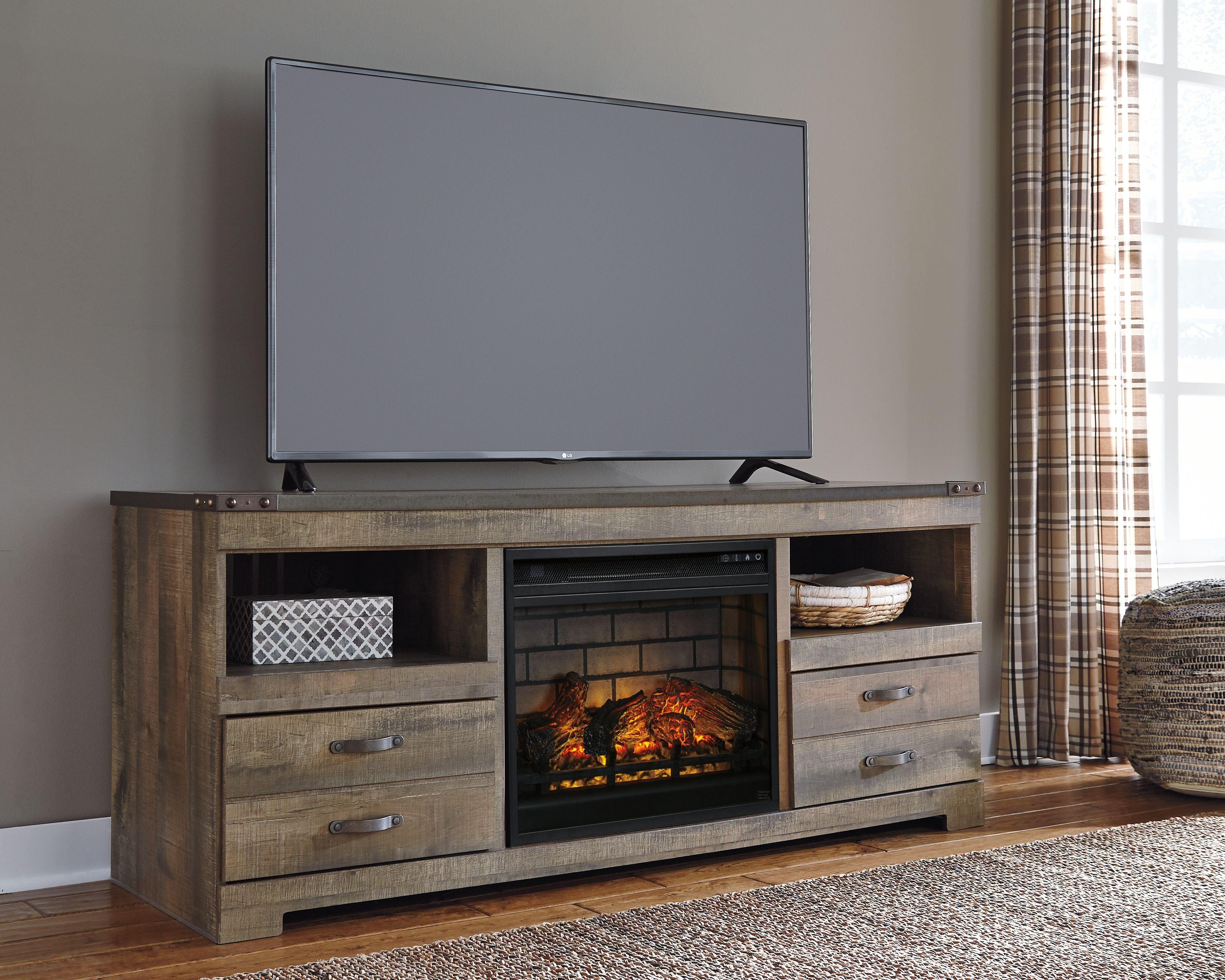 Signature Design by Ashley® - Trinell - Brown - 63" TV Stand With Glass/Stone Fireplace Insert - 5th Avenue Furniture