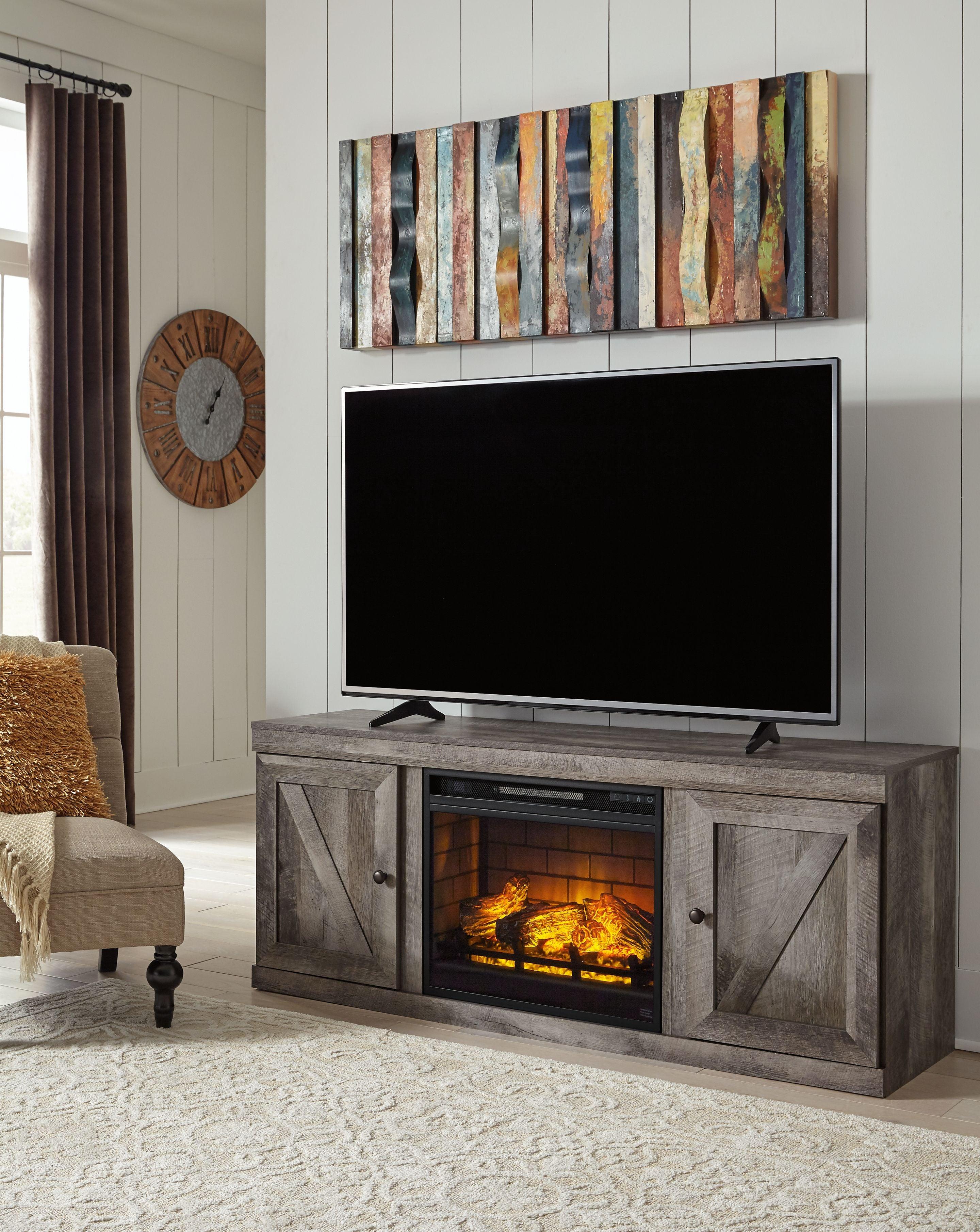 Signature Design by Ashley® - Wynnlow - Gray - TV Stand With Faux Firebrick Fireplace Insert - 5th Avenue Furniture