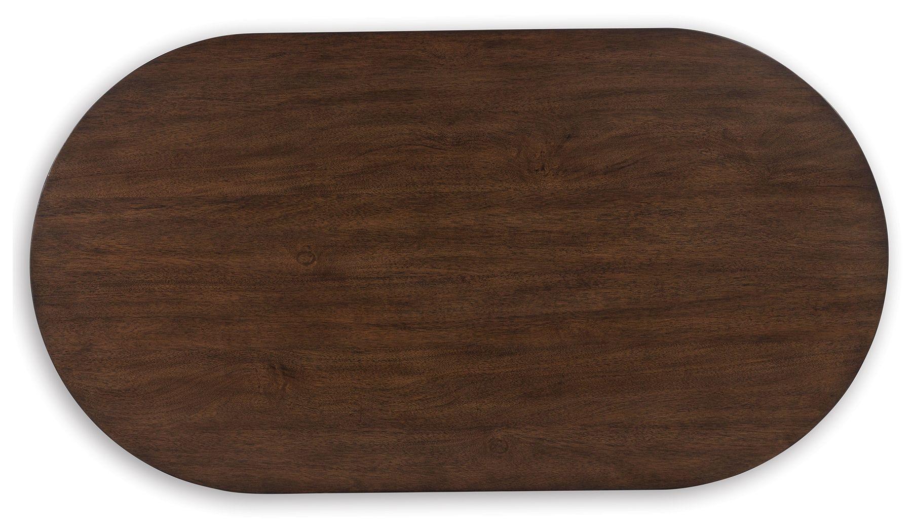 Signature Design by Ashley® - Korestone - Dark Brown - Oval Cocktail Table - 5th Avenue Furniture