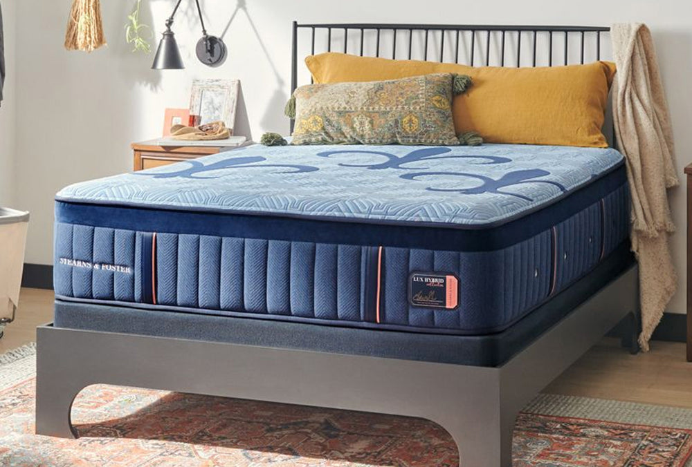 Stearns & Foster mattress in a bright furnished bedroom