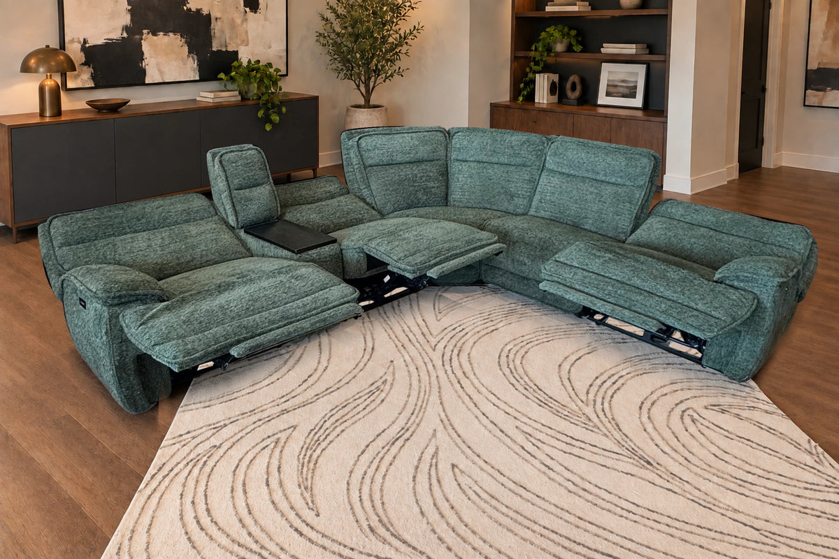 Three power recliners extended on the Tribeca Jade sectional in a warm living room
