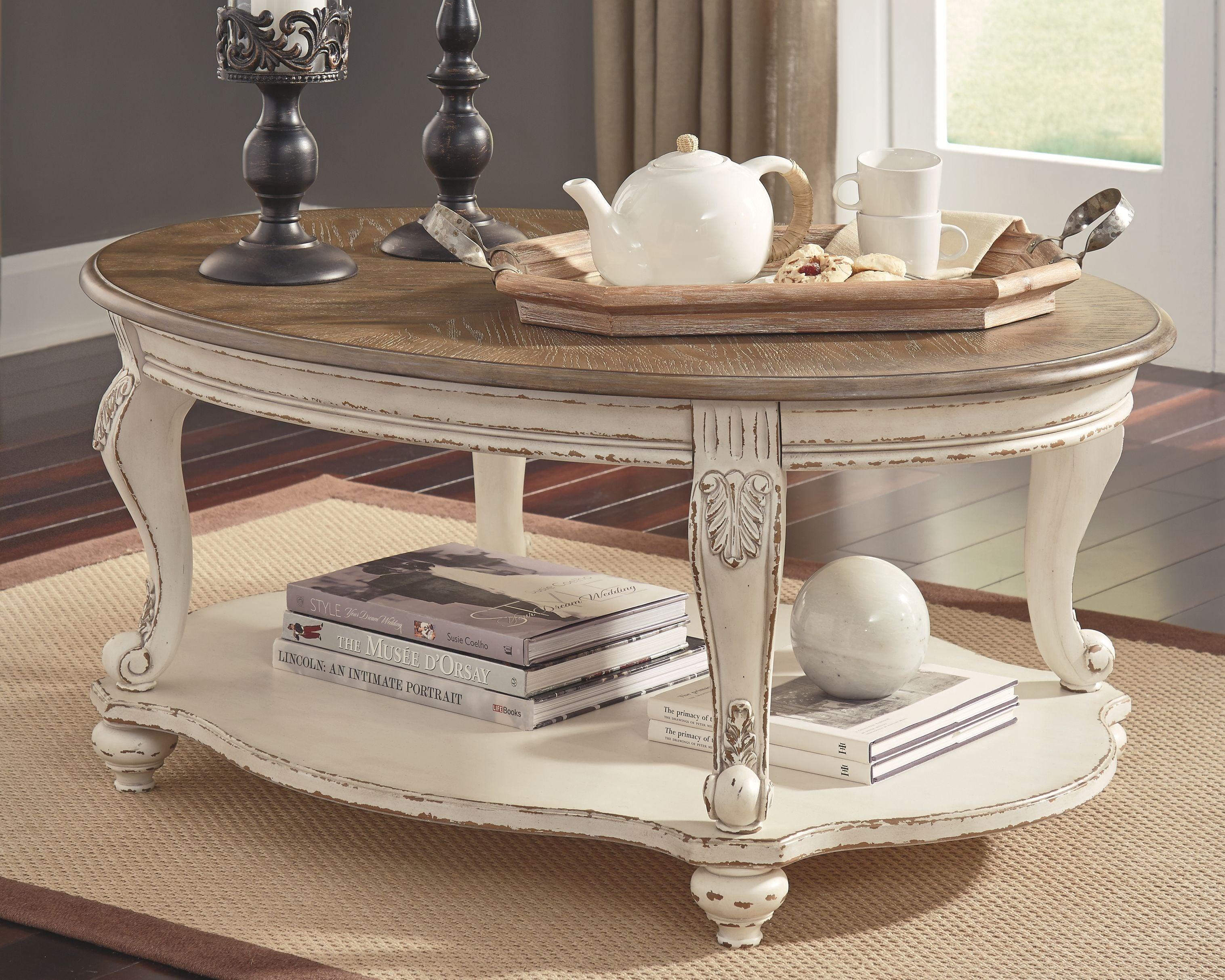 Ashley Furniture - Realyn - White / Brown - Oval Cocktail Table - 5th Avenue Furniture