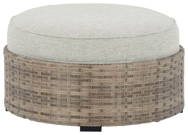 Ashley Furniture - Calworth - Beige - Ottoman With Cushion - 5th Avenue Furniture