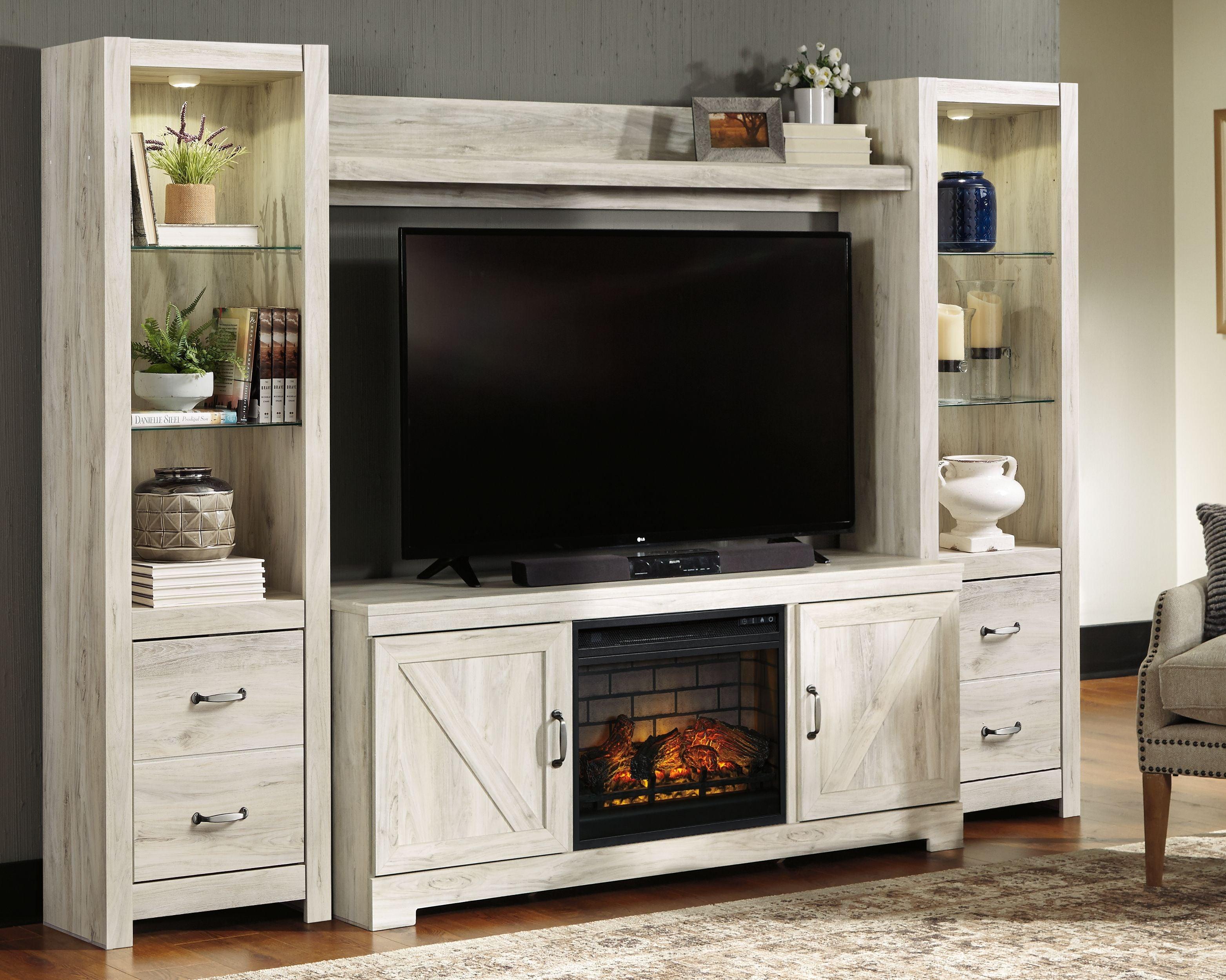 Signature Design by Ashley® - Bellaby - Whitewash - Entertainment Center - TV Stand With Faux Firebrick Fireplace Insert - 5th Avenue Furniture