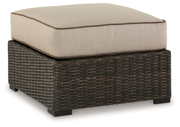 Signature Design by Ashley® - Coastline Bay - Brown - Ottoman With Cushion - 5th Avenue Furniture