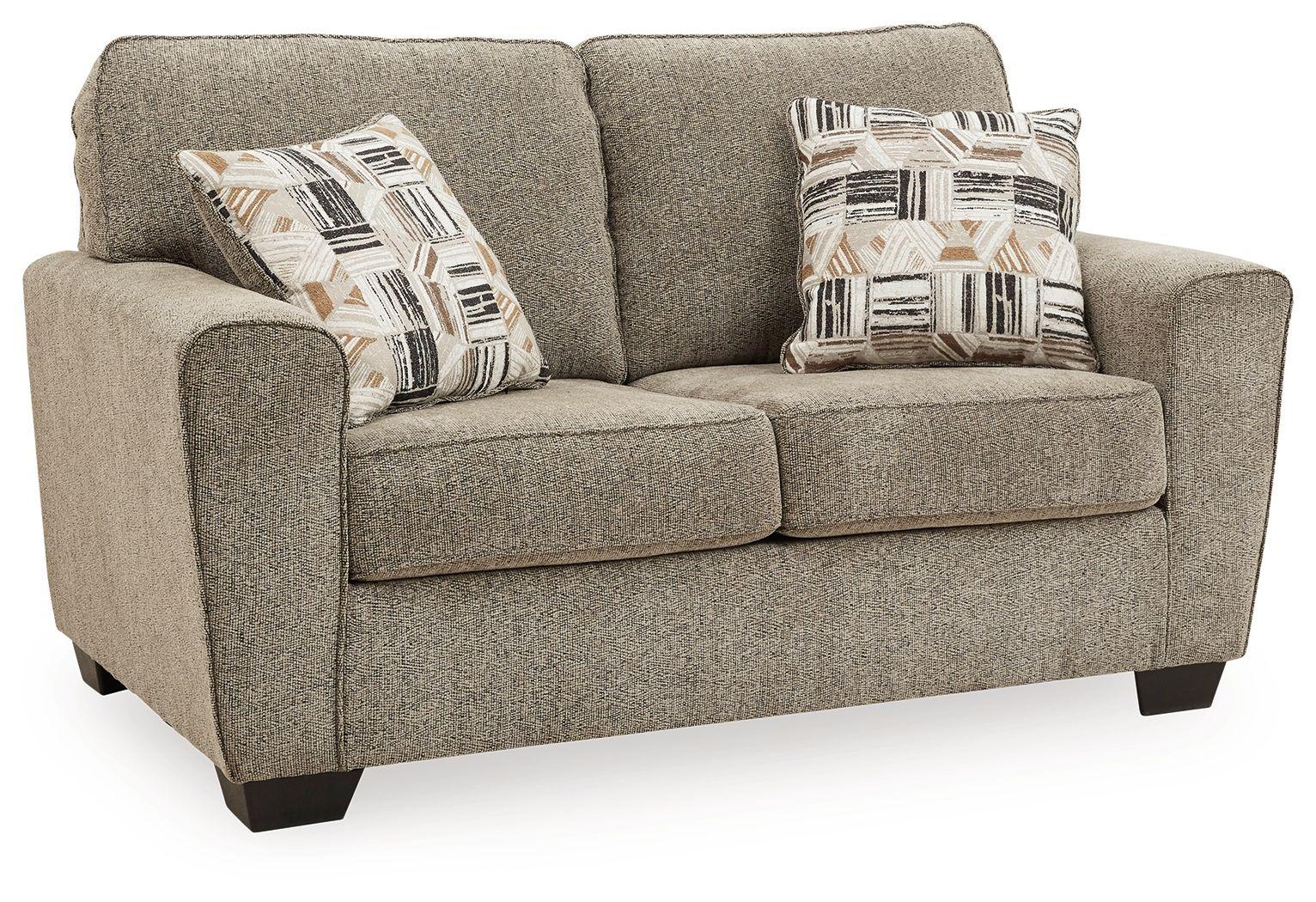 Ashley Furniture - Mccluer - Mocha - Loveseat - 5th Avenue Furniture